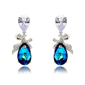 Wholesale crystal bow earrings with clear teardrop Swarovski element stones and platinum plated copper from JuneJewelry.com – bulk bridal ribbon jewelry.