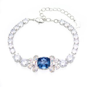 Wholesale blue crystal bracelet with square Swarovski Elements crystal and butterfly accents on platinum plated brass by JuneJewelry.com – luxury bulk jewelry.