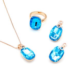 Wholesale blue crystal set featuring emerald-cut sky blue stones and rose gold plated zinc alloy from JuneJewelry.com – fashion jewelry for bulk orders.
