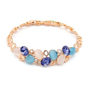 Wholesale opal crystal bracelet featuring purple crystals and blue cat eye stones on rose gold plated zinc alloy from JuneJewelry.com.