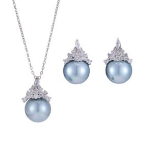 High-end light luxury crown pearl jewelry set wholesale featuring a delicate micro-pave zircon tiara cap pendant necklace and matching pearl stud earrings on junejewelry.com