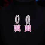 Elegant geometric square crystal jewelry wholesale set featuring micro-pave rhinestone huggie hoop earrings and matching pendant necklace from junejewelry.com