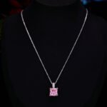 Elegant geometric square crystal jewelry wholesale set featuring micro-pave rhinestone huggie hoop earrings and matching pendant necklace from junejewelry.com