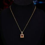 Elegant geometric square crystal jewelry wholesale set featuring micro-pave rhinestone huggie hoop earrings and matching pendant necklace from junejewelry.com