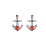 Niche Western style anchor cross jewelry set wholesale showing a brilliant micro-pave crystal ship anchor pendant necklace and matching stud earrings from junejewelry.com