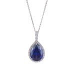 Premium luxury teardrop zircon jewelry set wholesale featuring a solitaire pear-cut pendant necklace, drop earrings, and halo ring on junejewelry.com