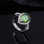Premium luxury teardrop zircon jewelry set wholesale featuring a solitaire pear-cut pendant necklace, drop earrings, and halo ring on junejewelry.com