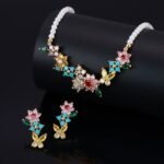 Luxurious French garden pearl jewelry set wholesale featuring colorful zircon floral elements and butterfly drop earrings on junejewelry.com