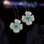 Elegant vintage French style camellia zircon jewelry set wholesale featuring a multi-layered micro-pave crystal flower pendant on an asymmetric pearl chain and matching flower stud earrings on junejewelry.com