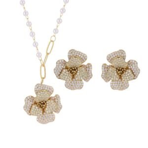 Elegant vintage French style camellia zircon jewelry set wholesale featuring a multi-layered micro-pave crystal flower pendant on an asymmetric pearl chain and matching flower stud earrings on junejewelry.com