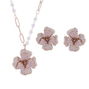 Elegant vintage French style camellia zircon jewelry set wholesale featuring a multi-layered micro-pave crystal flower pendant on an asymmetric pearl chain and matching flower stud earrings on junejewelry.com