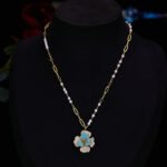 Elegant vintage French style camellia zircon jewelry set wholesale featuring a multi-layered micro-pave crystal flower pendant on an asymmetric pearl chain and matching flower stud earrings on junejewelry.com