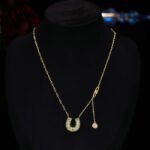 Sparkly horseshoe U shape jewelry set wholesale featuring micro zircon pendant necklace and stud earrings in 18K gold plating from junejewelry.com
