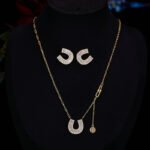Sparkly horseshoe U shape jewelry set wholesale featuring micro zircon pendant necklace and stud earrings in 18K gold plating from junejewelry.com
