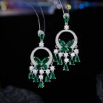 High-end butterfly zircon jewelry set wholesale with teardrop crystal tassels, including a statement choker necklace and drop earrings from junejewelry.com