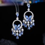 High-end butterfly zircon jewelry set wholesale with teardrop crystal tassels, including a statement choker necklace and drop earrings from junejewelry.com