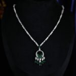 High-end butterfly zircon jewelry set wholesale with teardrop crystal tassels, including a statement choker necklace and drop earrings from junejewelry.com