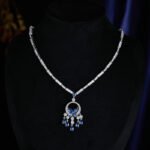 High-end butterfly zircon jewelry set wholesale with teardrop crystal tassels, including a statement choker necklace and drop earrings from junejewelry.com