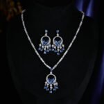 High-end butterfly zircon jewelry set wholesale with teardrop crystal tassels, including a statement choker necklace and drop earrings from junejewelry.com
