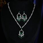 High-end butterfly zircon jewelry set wholesale with teardrop crystal tassels, including a statement choker necklace and drop earrings from junejewelry.com