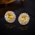 High-end oval zircon pearl jewelry set wholesale featuring a royal crystal cluster pendant on a classic pearl strand and matching statement stud earrings from junejewelry.com