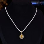 High-end oval zircon pearl jewelry set wholesale featuring a royal crystal cluster pendant on a classic pearl strand and matching statement stud earrings from junejewelry.com