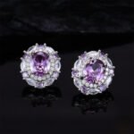 High-end oval zircon pearl jewelry set wholesale featuring a royal crystal cluster pendant on a classic pearl strand and matching statement stud earrings from junejewelry.com