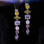 Light luxury colorful crystal resort jewelry set wholesale featuring a fresh multi-geometric cut gemstone collar necklace and matching linear drop earrings from junejewelry.com