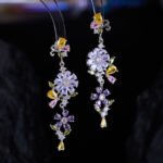 Retro wedding style light luxury vintage flower zircon jewelry set wholesale featuring an asymmetric half-link half-pearl chain cascading floral drop necklace and matching long drop earrings from junejewelry.com