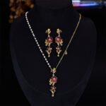 Retro wedding style light luxury vintage flower zircon jewelry set wholesale featuring an asymmetric half-link half-pearl chain cascading floral drop necklace and matching long drop earrings from junejewelry.com
