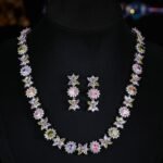 Western style heavy-craft luxury flower zircon jewelry set wholesale featuring an interlocking marquise and oval cut colorful crystal floral collar necklace with matching linear drop earrings from junejewelry.com