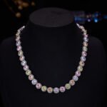 French style light luxury colorful zircon pearl jewelry set wholesale featuring a pastel halo crystal tennis necklace choker and matching triple-tier round gemstone pearl drop earrings from junejewelry.com