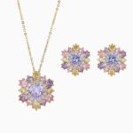Light luxury colorfast colorful zircon sunflower jewelry set wholesale featuring a brilliant multi-colored crystal cluster halo pendant necklace and matching sunflower stud earrings on a gold and platinum silver base from junejewelry.com.