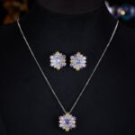 Light luxury colorfast colorful zircon sunflower jewelry set wholesale featuring a brilliant multi-colored crystal cluster halo pendant necklace and matching sunflower stud earrings on a gold and platinum silver base from junejewelry.com.