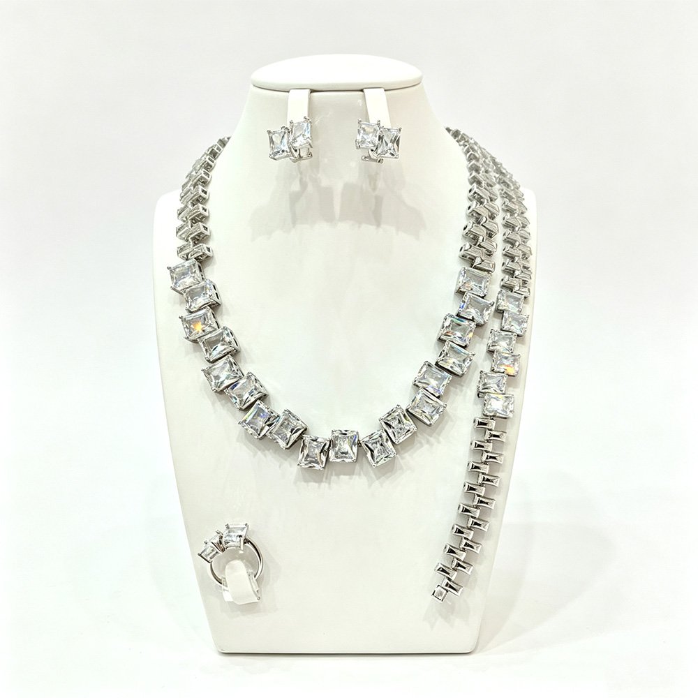 1 Wholesale square zircon set with emerald-cut clear crystals on real gold plated copper from JuneJewelry.com – luxury bridal jewelry for bulk buyers.