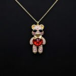 Wholesale Crystal Bear Necklace with pink Swarovski element crystals on platinum plated brass from JuneJewelry.com.