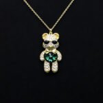 Wholesale Crystal Bear Necklace with pink Swarovski element crystals on platinum plated brass from JuneJewelry.com.