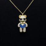 Wholesale Crystal Bear Necklace with pink Swarovski element crystals on platinum plated brass from JuneJewelry.com.