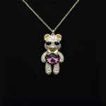 Wholesale Crystal Bear Necklace with pink Swarovski element crystals on platinum plated brass from JuneJewelry.com.