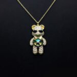 Wholesale Crystal Bear Necklace with pink Swarovski element crystals on platinum plated brass from JuneJewelry.com.