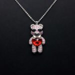 Wholesale Crystal Bear Necklace with pink Swarovski element crystals on platinum plated brass from JuneJewelry.com.