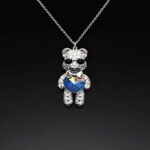Wholesale Crystal Bear Necklace with pink Swarovski element crystals on platinum plated brass from JuneJewelry.com.