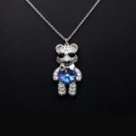 Wholesale Crystal Bear Necklace with pink Swarovski element crystals on platinum plated brass from JuneJewelry.com.