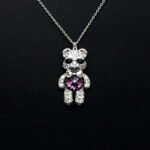 Wholesale Crystal Bear Necklace with pink Swarovski element crystals on platinum plated brass from JuneJewelry.com.