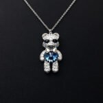 Wholesale Crystal Bear Necklace with pink Swarovski element crystals on platinum plated brass from JuneJewelry.com.