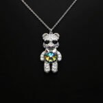 Wholesale Crystal Bear Necklace with pink Swarovski element crystals on platinum plated brass from JuneJewelry.com.