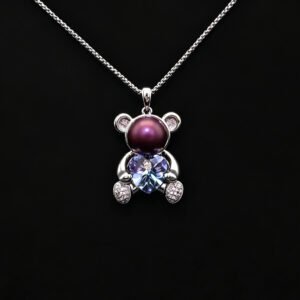 Wholesale Heart Bear Necklace with a crystal heart and pearl on platinum plated brass from JuneJewelry.com.