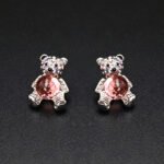 Wholesale Crystal Bear Earrings with pink Swarovski element crystals on platinum plated brass from JuneJewelry.com – cute fashion jewelry for bulk orders.