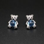 Wholesale Crystal Bear Earrings with pink Swarovski element crystals on platinum plated brass from JuneJewelry.com – cute fashion jewelry for bulk orders.