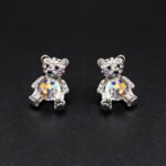 Wholesale Crystal Bear Earrings with pink Swarovski element crystals on platinum plated brass from JuneJewelry.com – cute fashion jewelry for bulk orders.